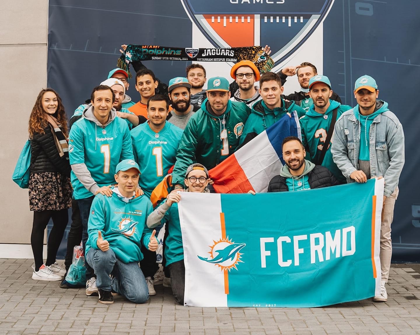 FCFRMD members holding up club flag